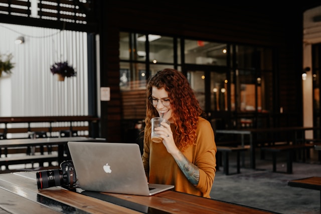 Woman at computer - best travel agency near me