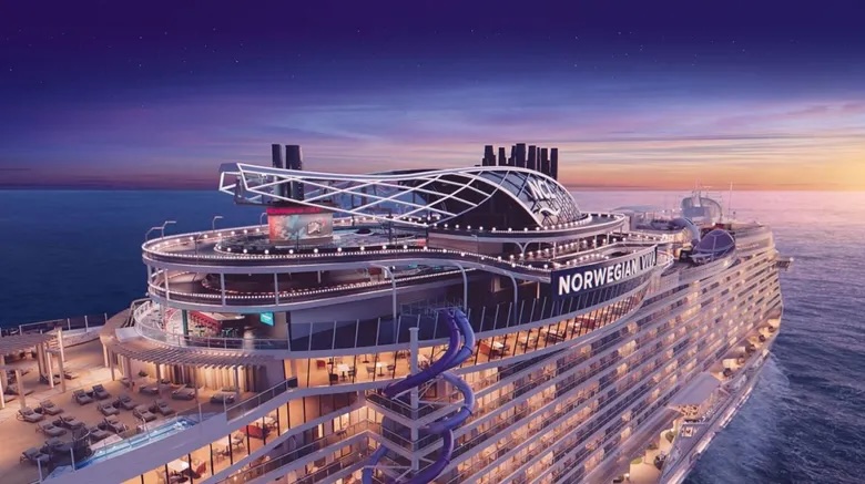 Norwegian Cruise Line travel agent - ship at night