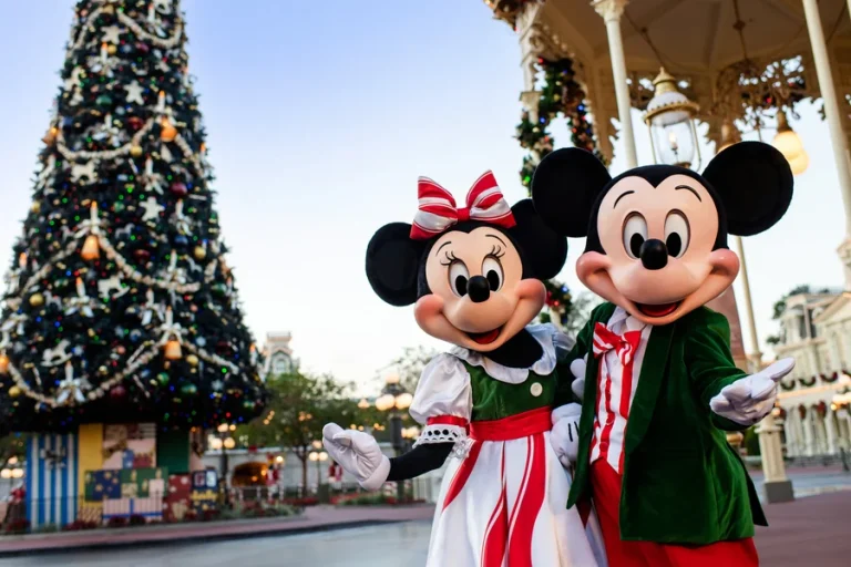 Mickey and Minnie dressed in holiday outfits